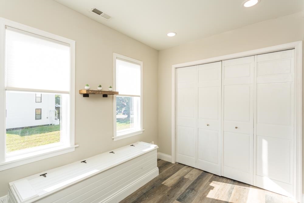 402 5th Street Shenandoah, VA 22849 - Photo 14 of 52 a bathroom with a bathtub a shower and a window