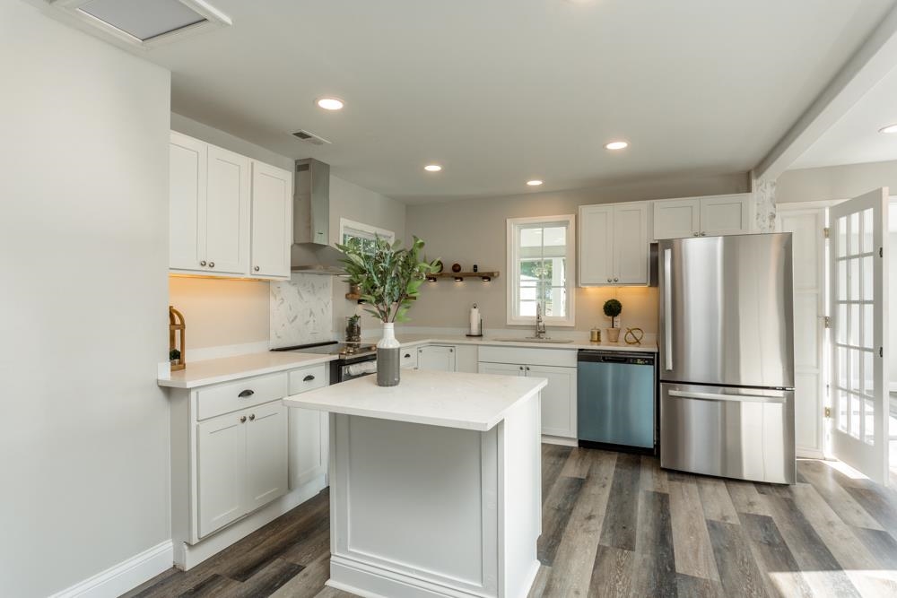 402 5th Street Shenandoah, VA 22849 - Photo 5 of 52 a kitchen with a refrigerator sink and cabinets