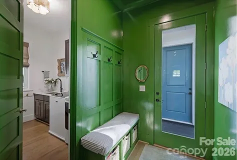 a utility room with sink dryer and washer