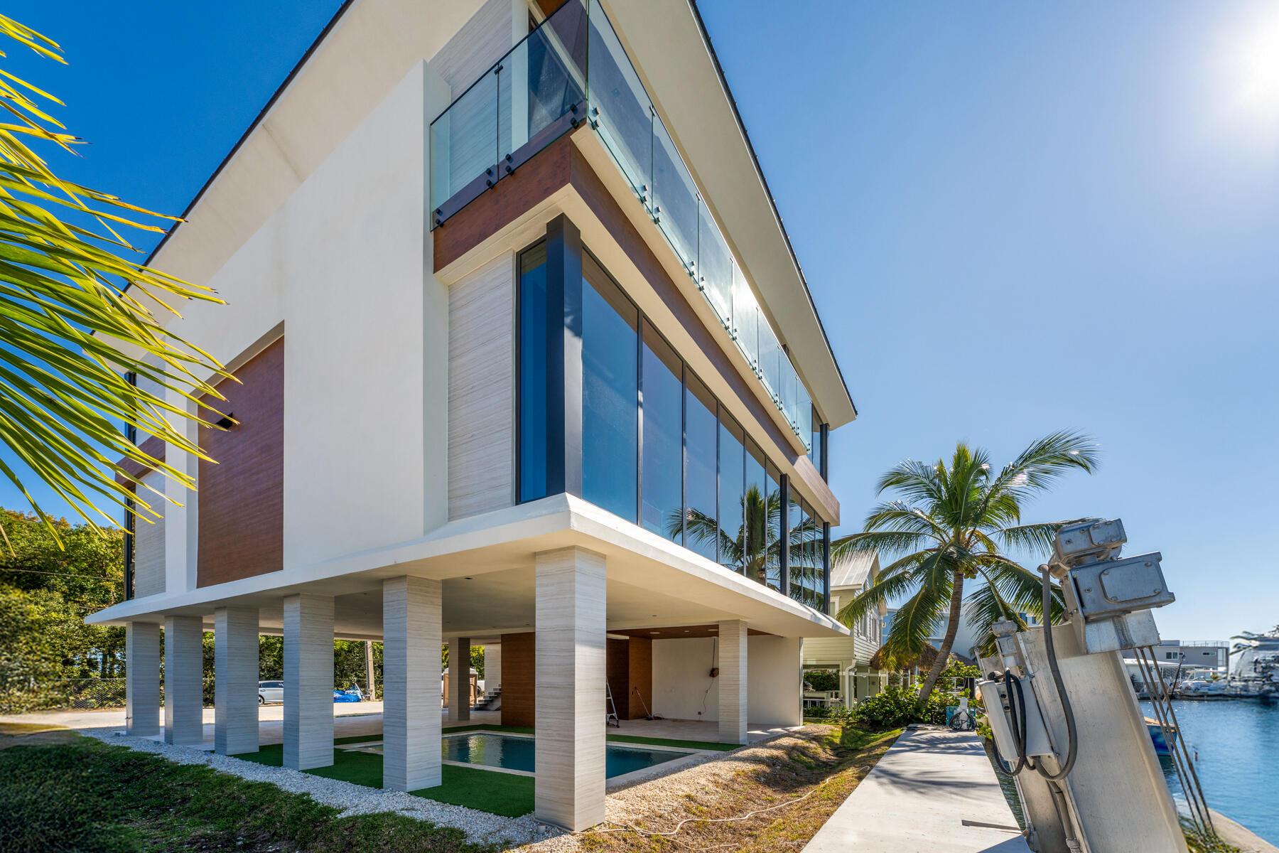 108 Coral Way Key Largo, FL 33037 - Photo 11 of 23 a view of a house with a yard