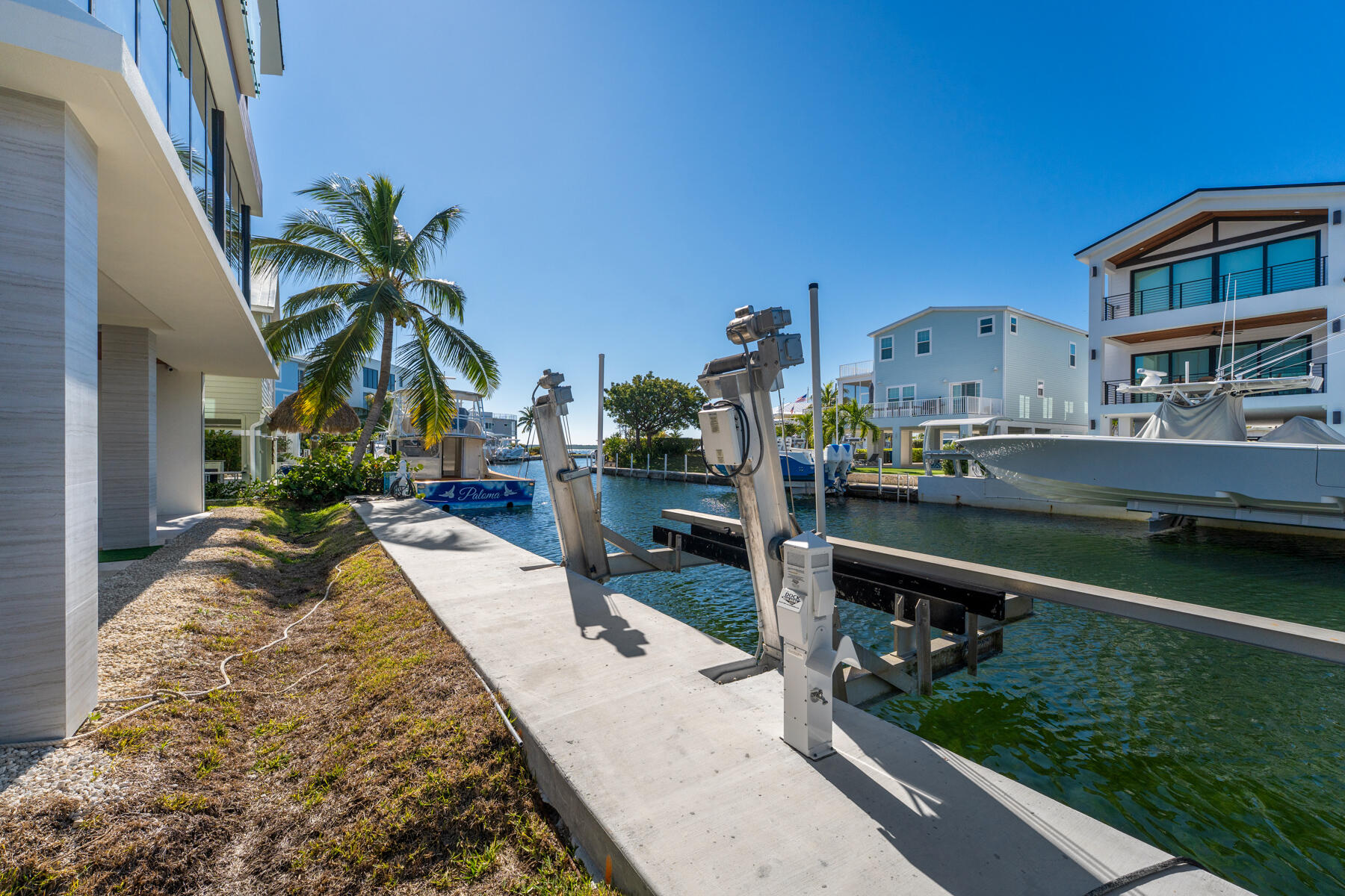 108 Coral Way Key Largo, FL 33037 - Photo 14 of 23 a house view with a garden space