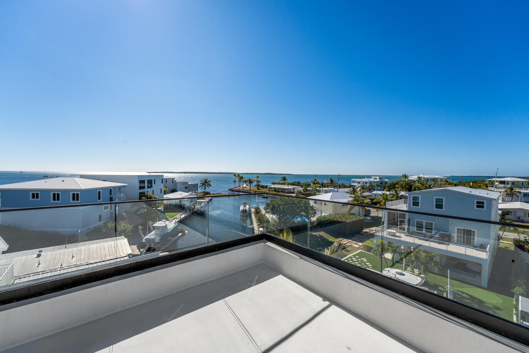 108 Coral Way Key Largo, FL 33037 - Photo 15 of 23 a view of a city from a balcony