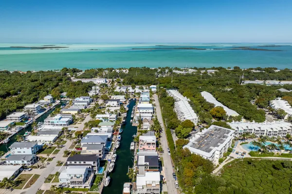 a view of a city with an ocean