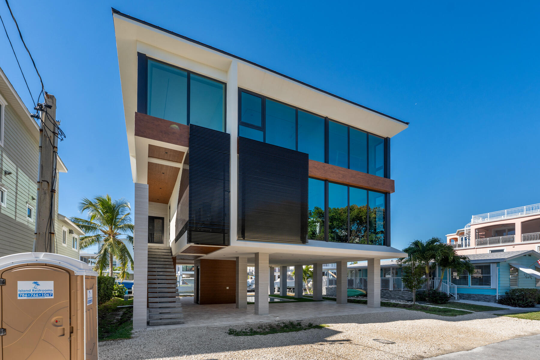 108 Coral Way Key Largo, FL 33037 - Photo 4 of 23 a front view of building with street