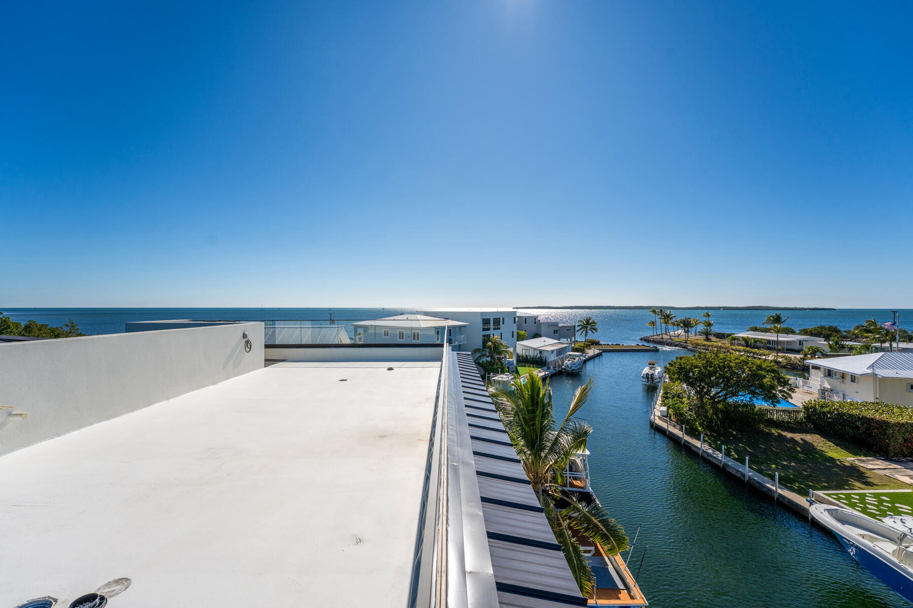 108 Coral Way Key Largo, FL 33037 - Photo 6 of 23 a view of a balcony with chairs