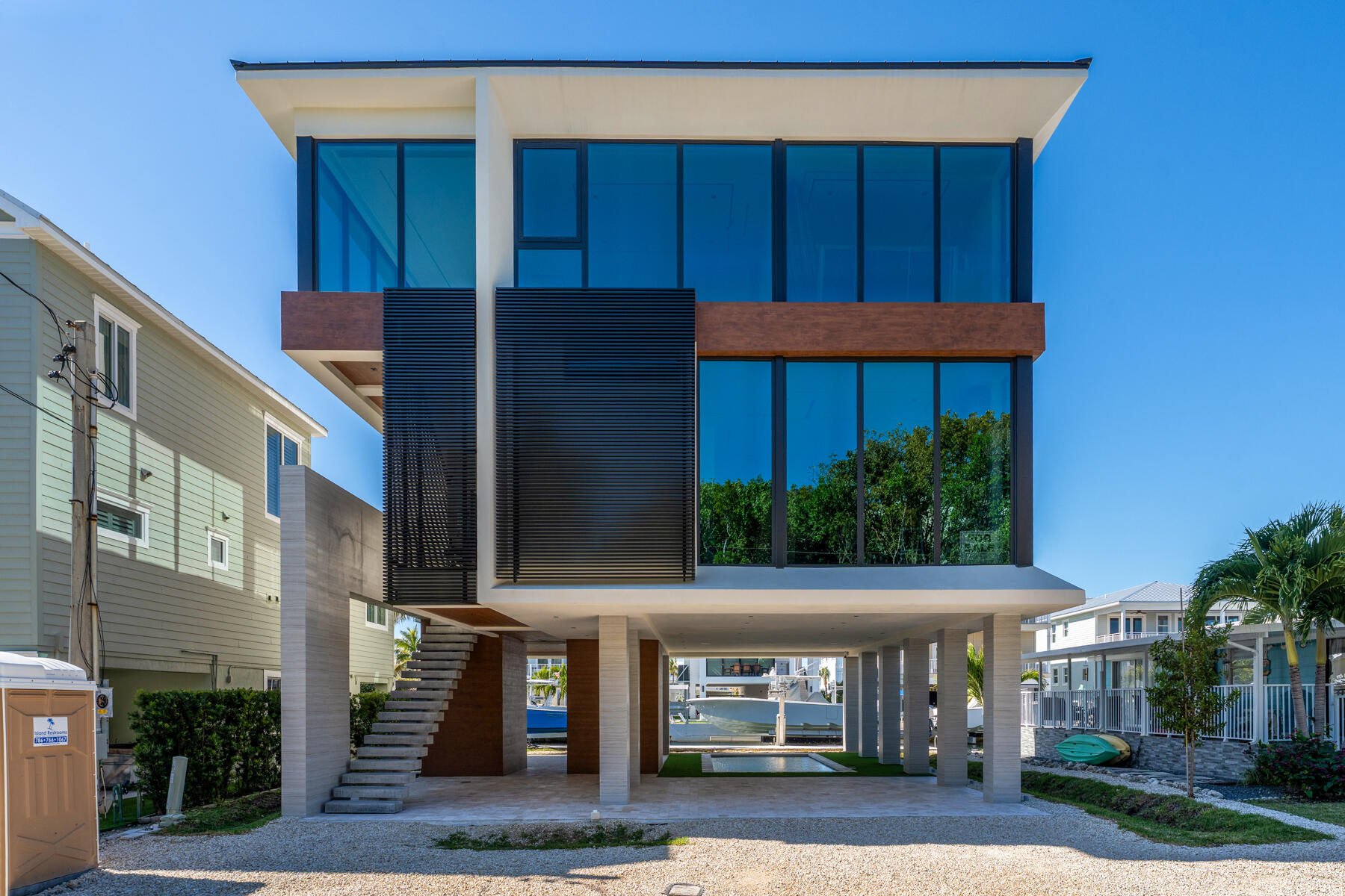 108 Coral Way Key Largo, FL 33037 - Photo 9 of 23 a view of a house with door and outdoor space
