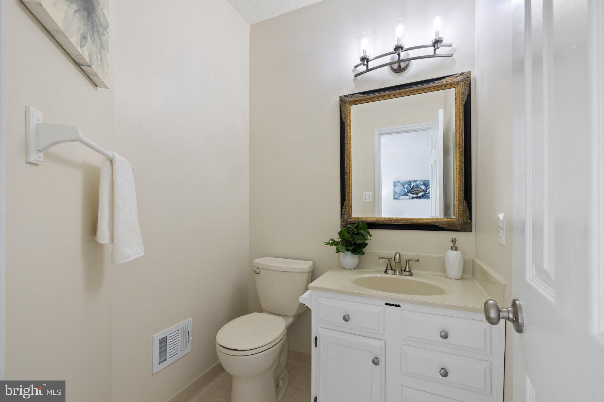 14092 Winding Ridge Lane Centreville, VA 20121 - Photo 11 of 45 Main Level Powder Room