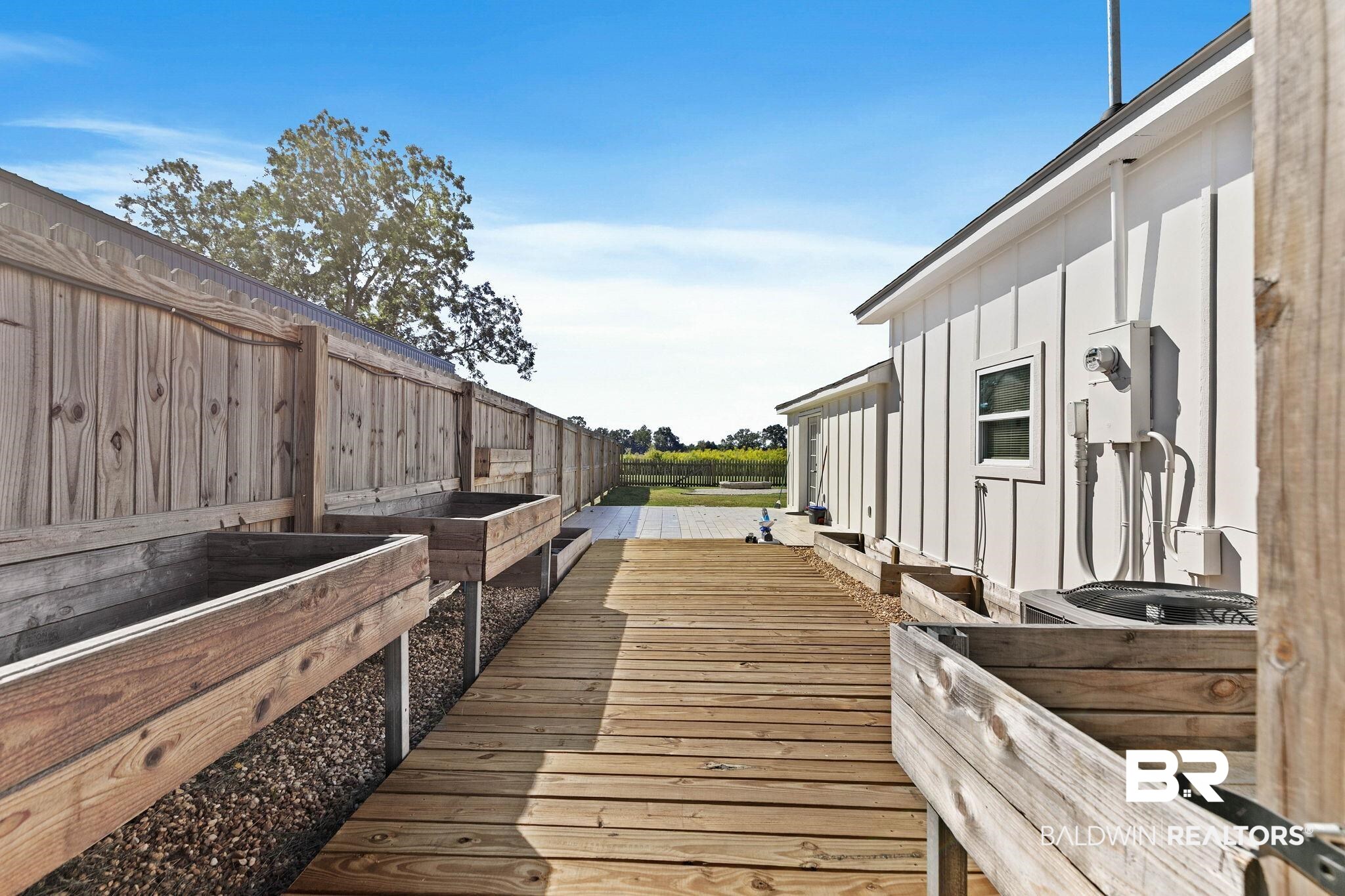 16796 Thompson Road Loxley, AL 36551 - Photo 48 of 93 Wooden terrace featuring a fenced backyard