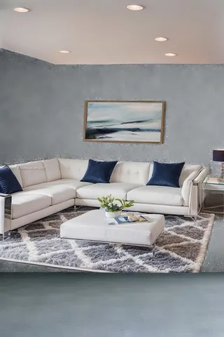 a living room with furniture and a couch