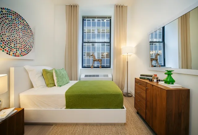 a bathroom with a toilet sink and bathtub