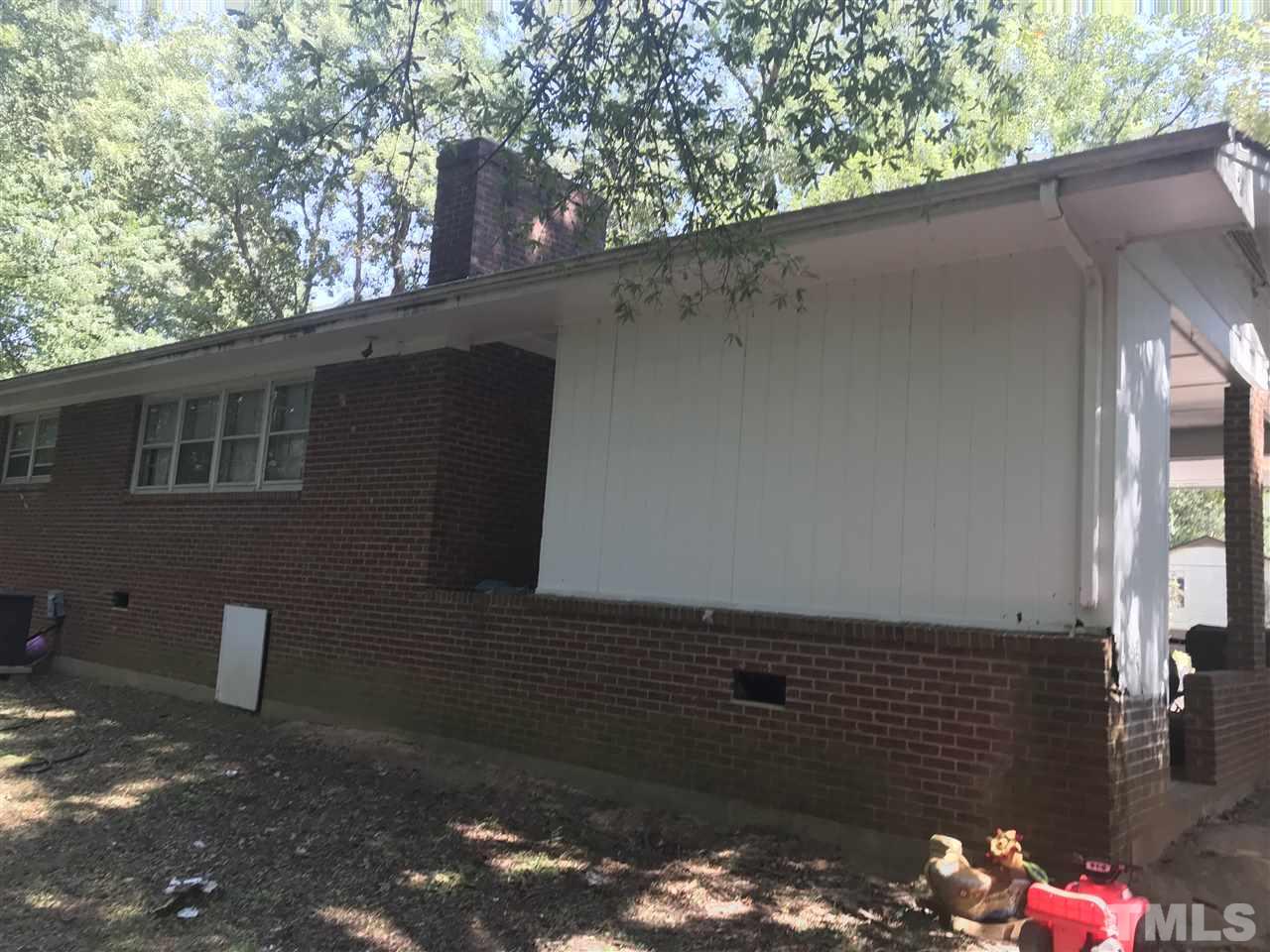 312 Parrish Street Raleigh, NC 27610 - Photo 3 of 4 a backyard of a house