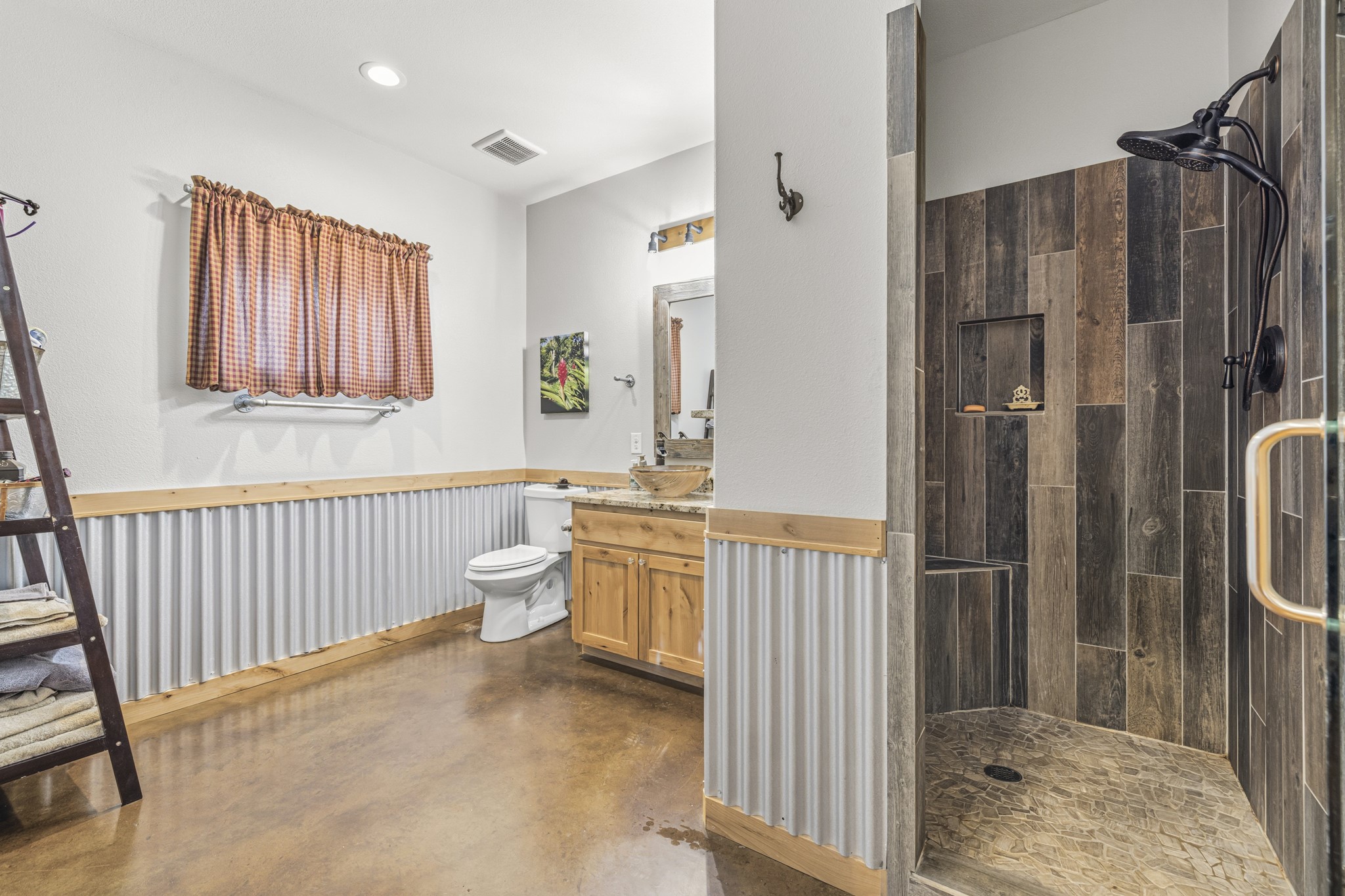 3724 Ranch Road 3347 Round Mountain, TX 78663 - Photo 26 of 40 a bathroom with a sink a toilet and shower
