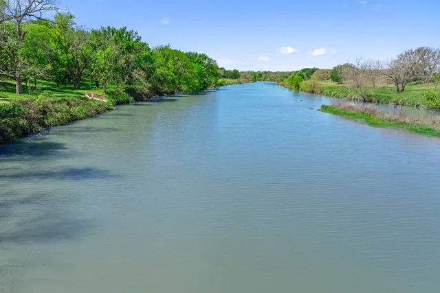 a view of a lake with outdoor space