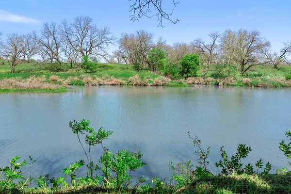 a view of a lake with a mountain and a lake view