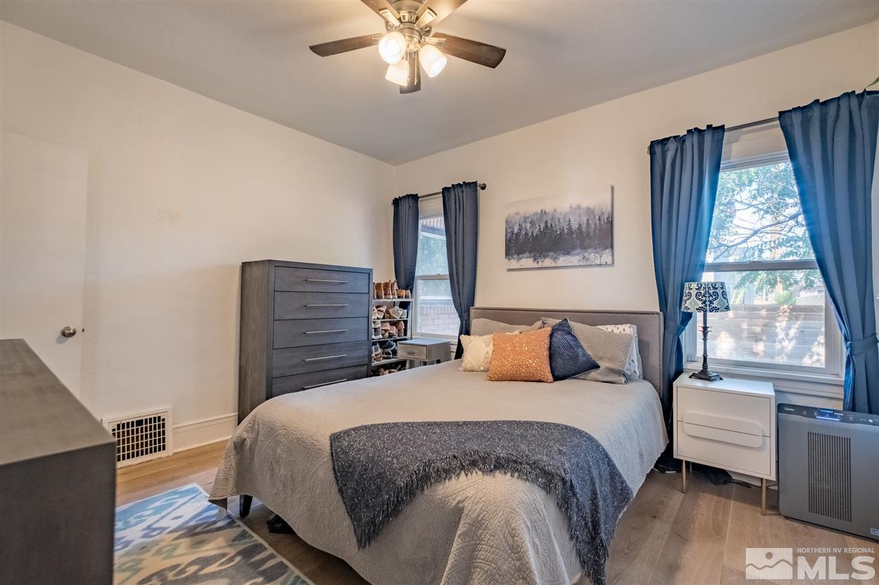 221 Moran Street Reno, NV 89501 - Photo 12 of 23 a bedroom with a bed and a painting on the wall