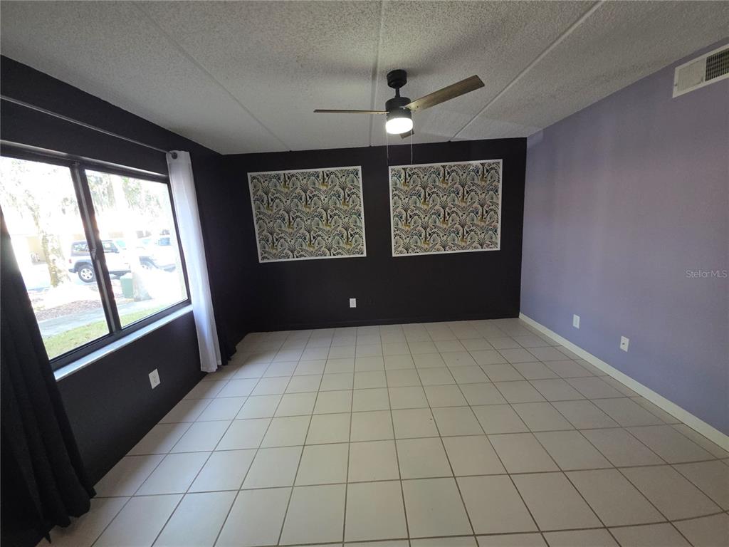 1601 Big Tree Road, Unit 901 Daytona Beach, FL 32119 - Photo 2 of 68 a view of an empty room with a window