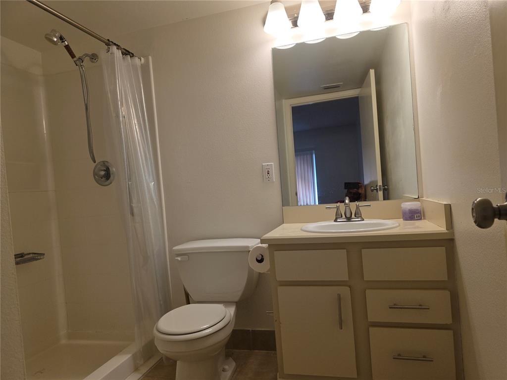 1601 Big Tree Road, Unit 901 Daytona Beach, FL 32119 - Photo 42 of 68 a bathroom with a sink toilet and shower