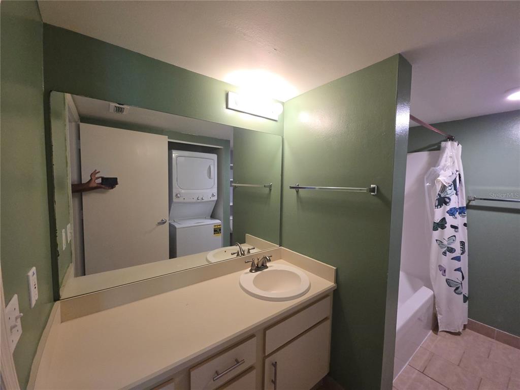 1601 Big Tree Road, Unit 901 Daytona Beach, FL 32119 - Photo 45 of 68 a bathroom with a sink and a mirror