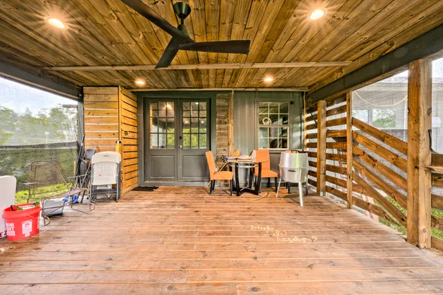 a view of a hall with wooden floor