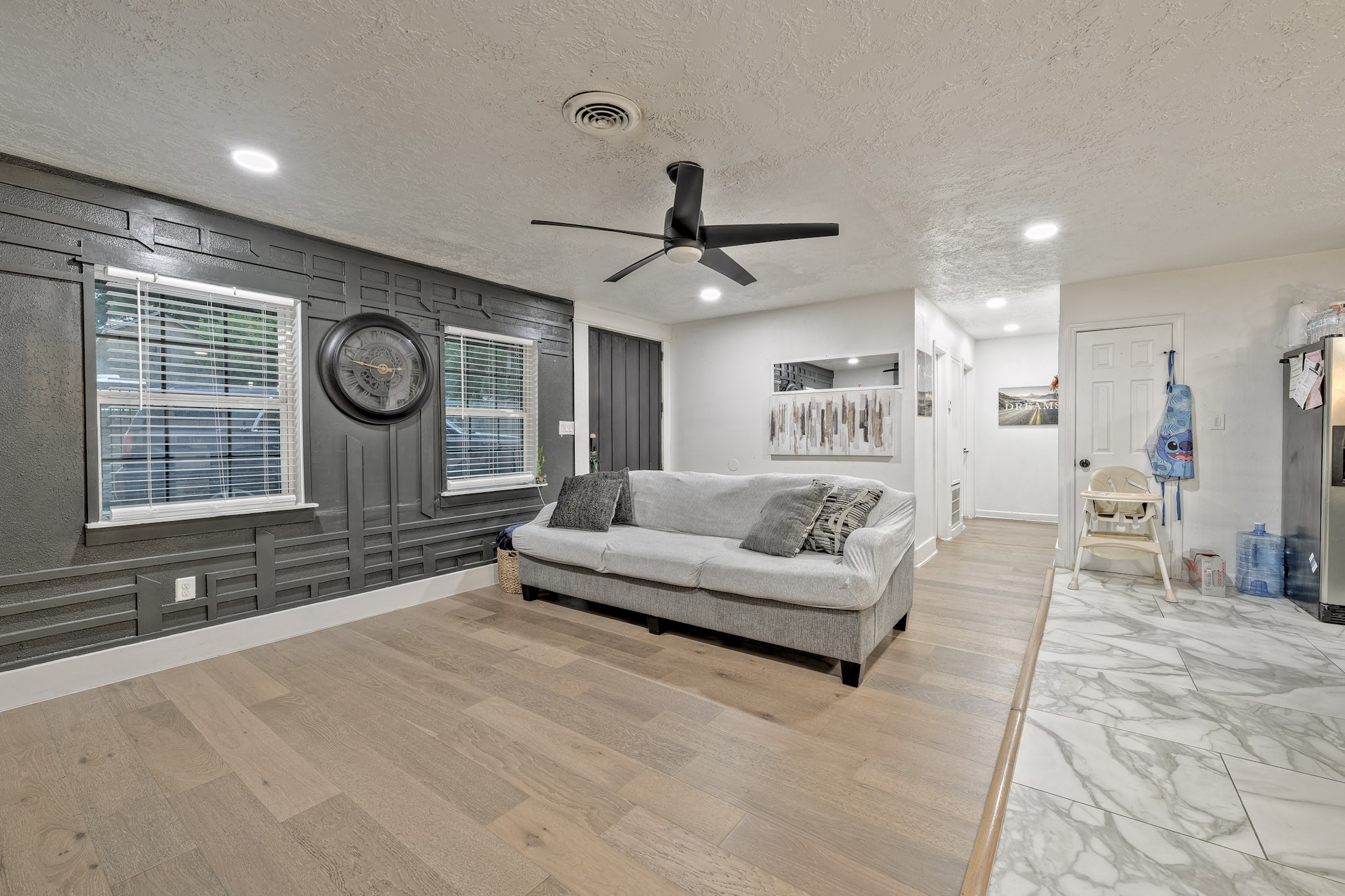826 Rosewick Street Houston, TX 77015 - Photo 2 of 17 a living room with furniture and a large window