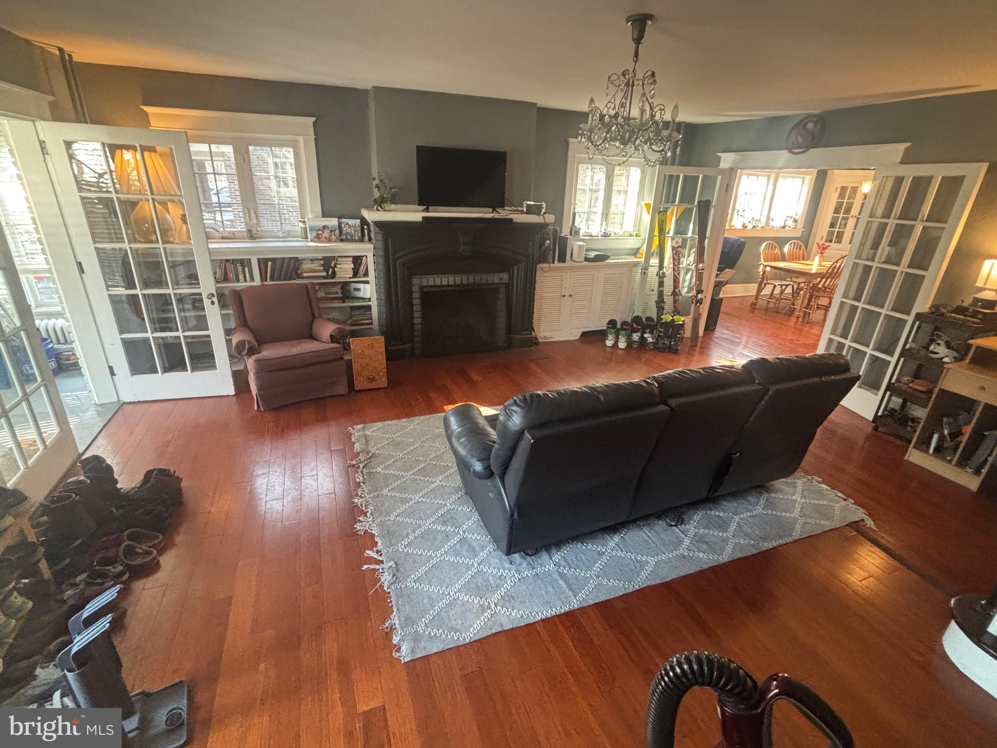 523 Country Club Road York, PA 17403 - Photo 12 of 30 a living room with furniture a flat screen tv and a fireplace