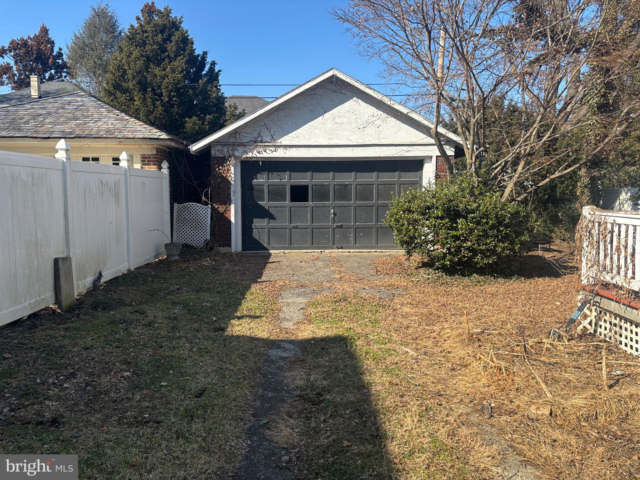 523 Country Club Road York, PA 17403 - Photo 26 of 30 a front view of a house with a yard and garage