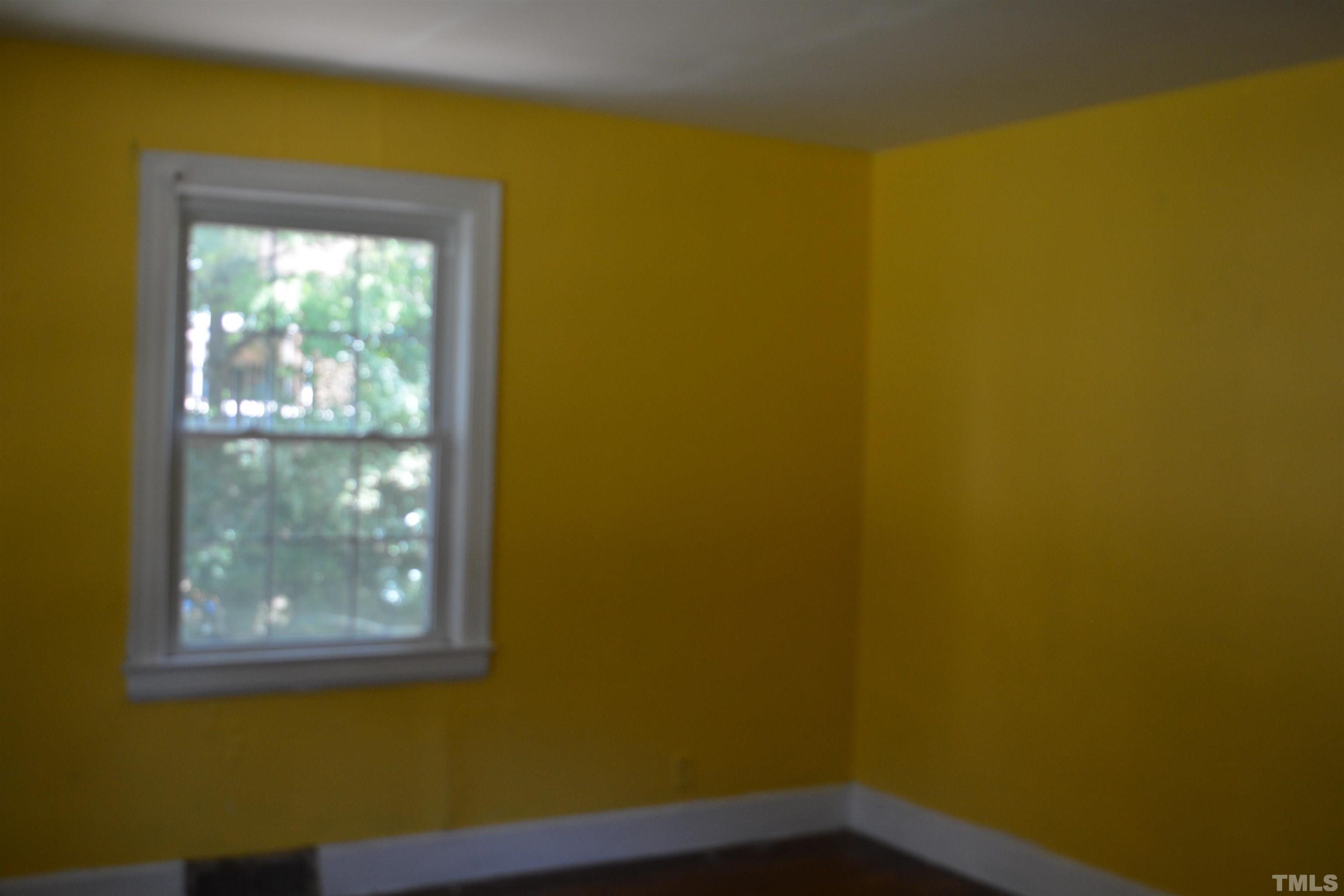 615 Arnette Avenue Durham, NC 27701 - Photo 6 of 12 a view of a small space with a window
