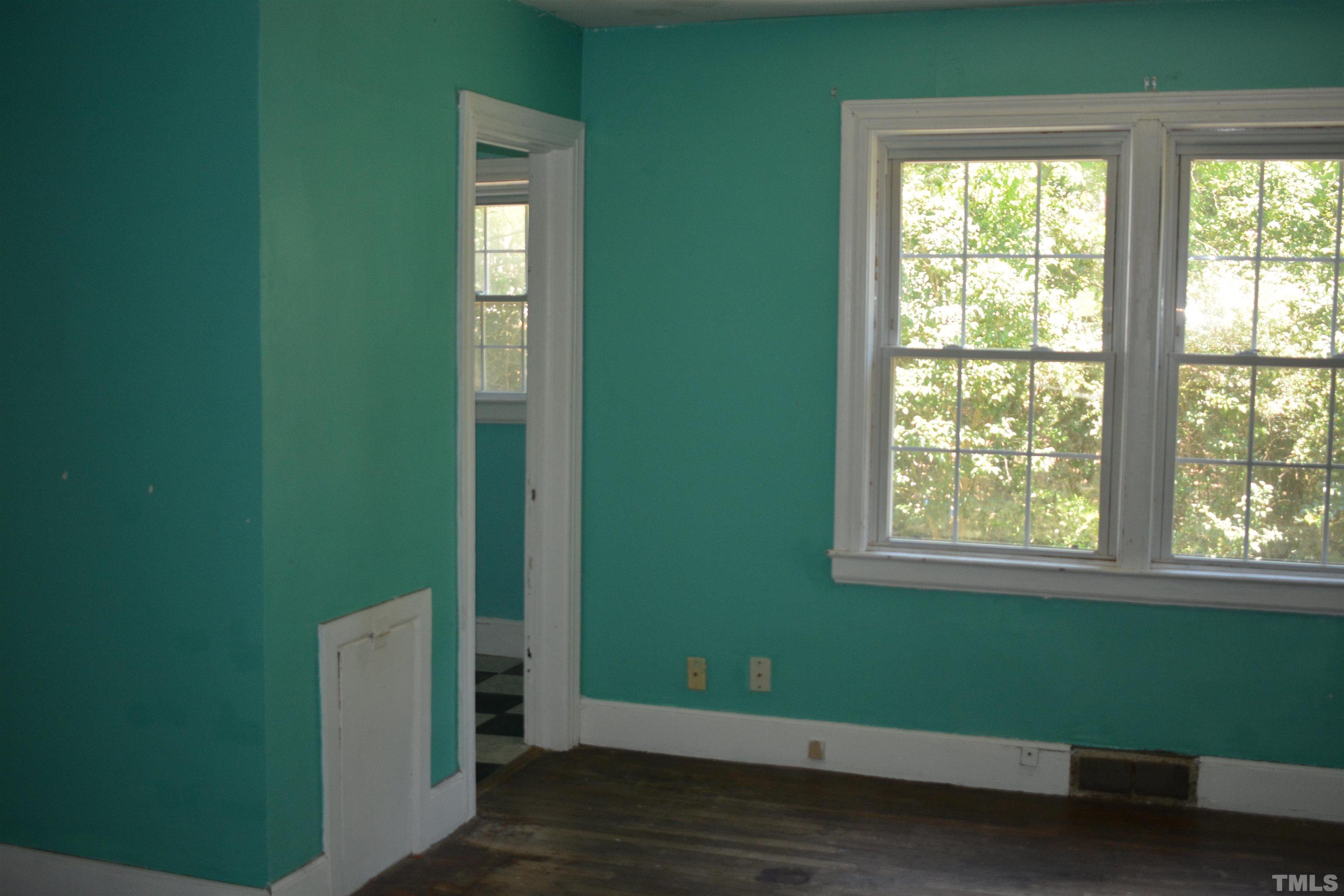 615 Arnette Avenue Durham, NC 27701 - Photo 7 of 12 a view of a room that has a window in it