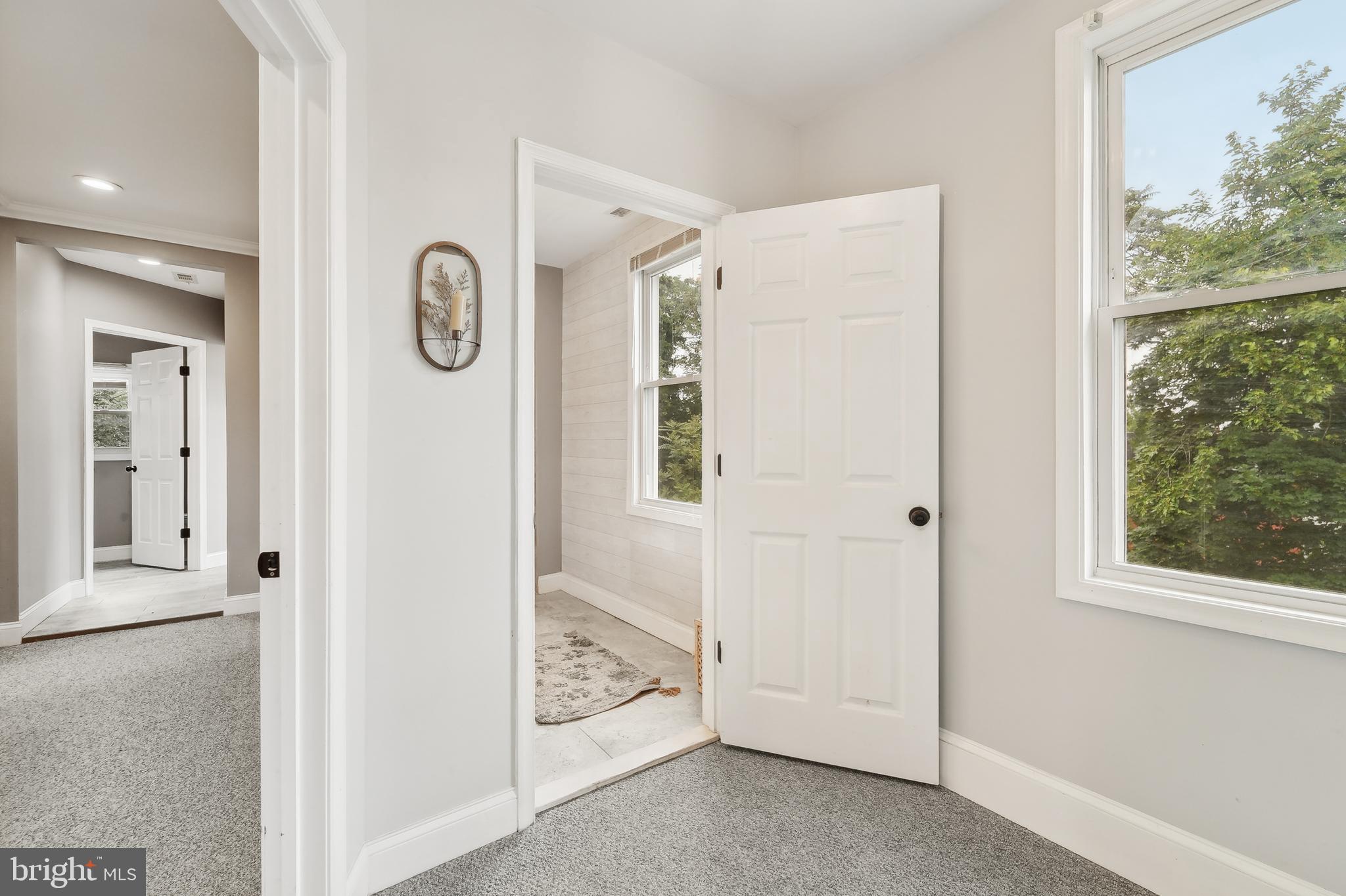 4124 Hamilton Avenue Baltimore, MD 21206 - Photo 22 of 41 a view of a hallway with closet and front door