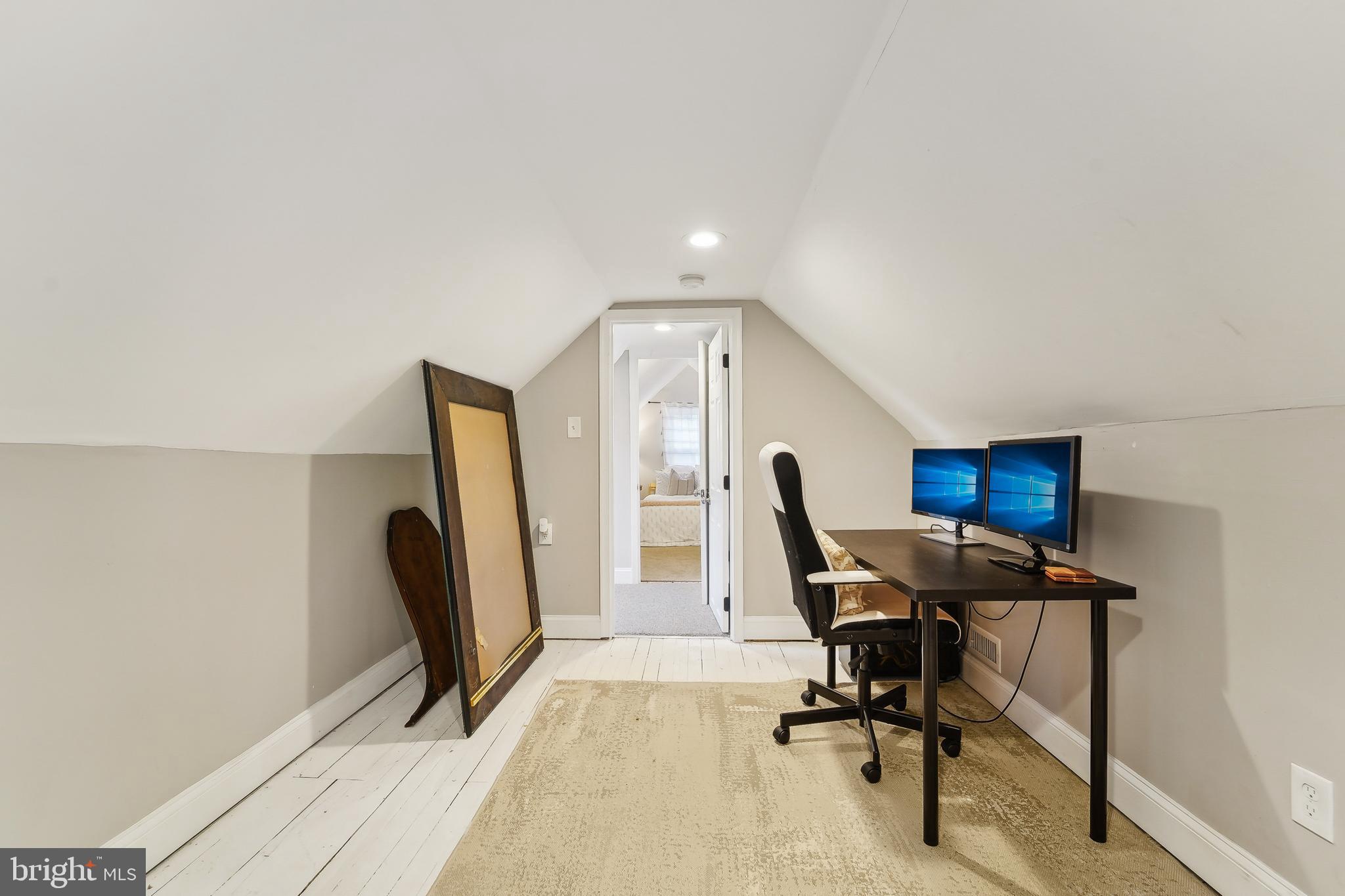 4124 Hamilton Avenue Baltimore, MD 21206 - Photo 33 of 41 a view of a workspace with furniture and a window