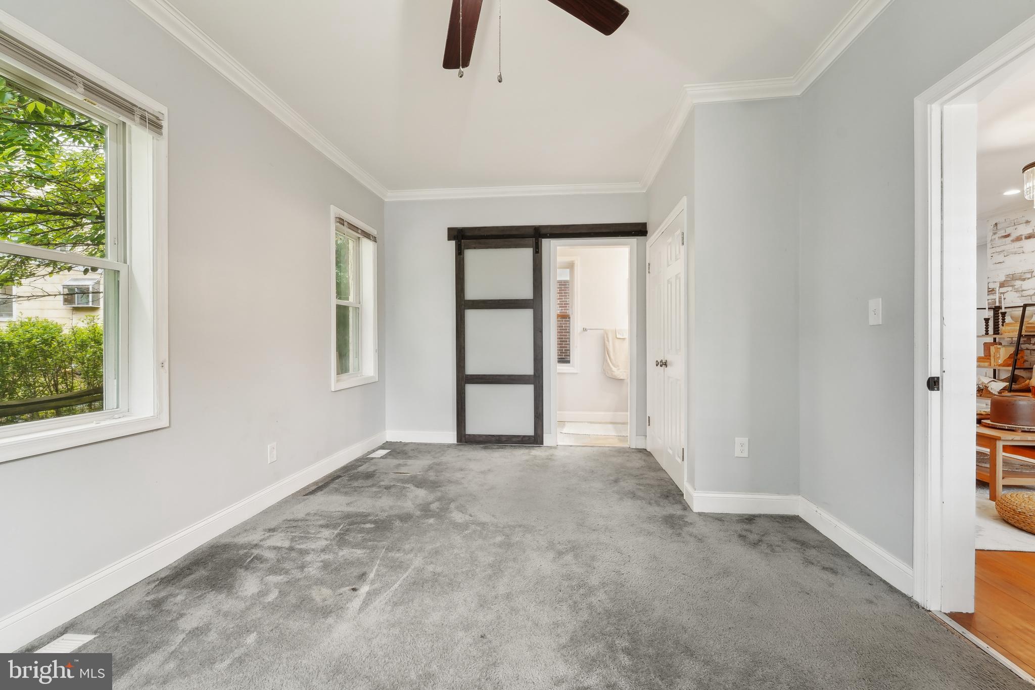 4124 Hamilton Avenue Baltimore, MD 21206 - Photo 34 of 41 an empty room with windows and closet