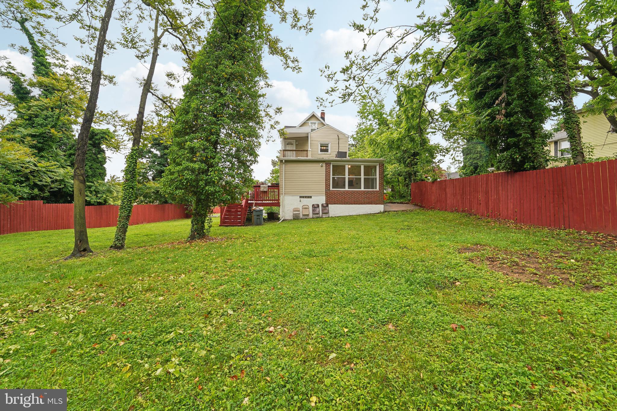 4124 Hamilton Avenue Baltimore, MD 21206 - Photo 39 of 41 a view of a house with a yard and sitting area