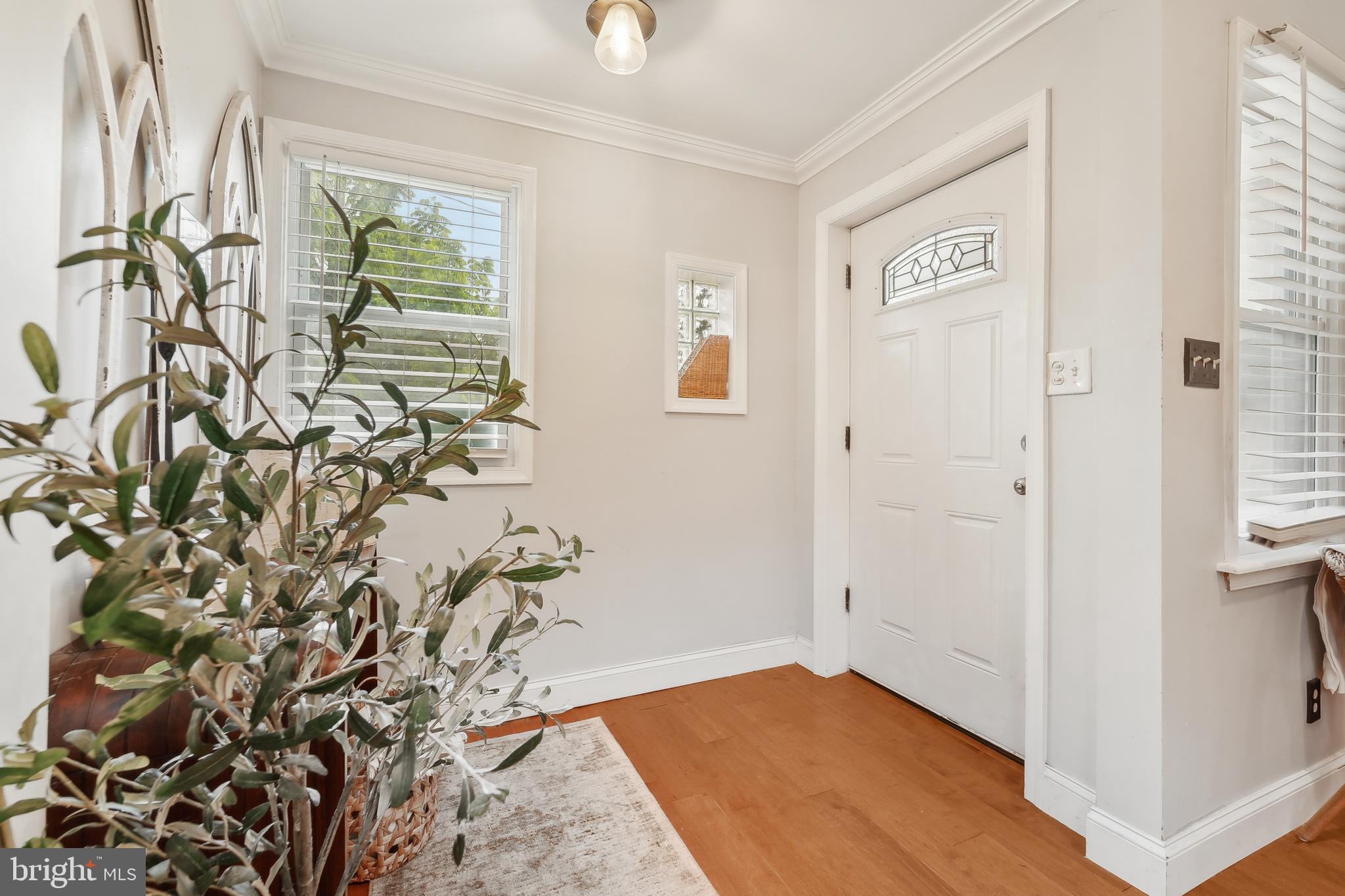 4124 Hamilton Avenue Baltimore, MD 21206 - Photo 7 of 41 a view of entryway with window