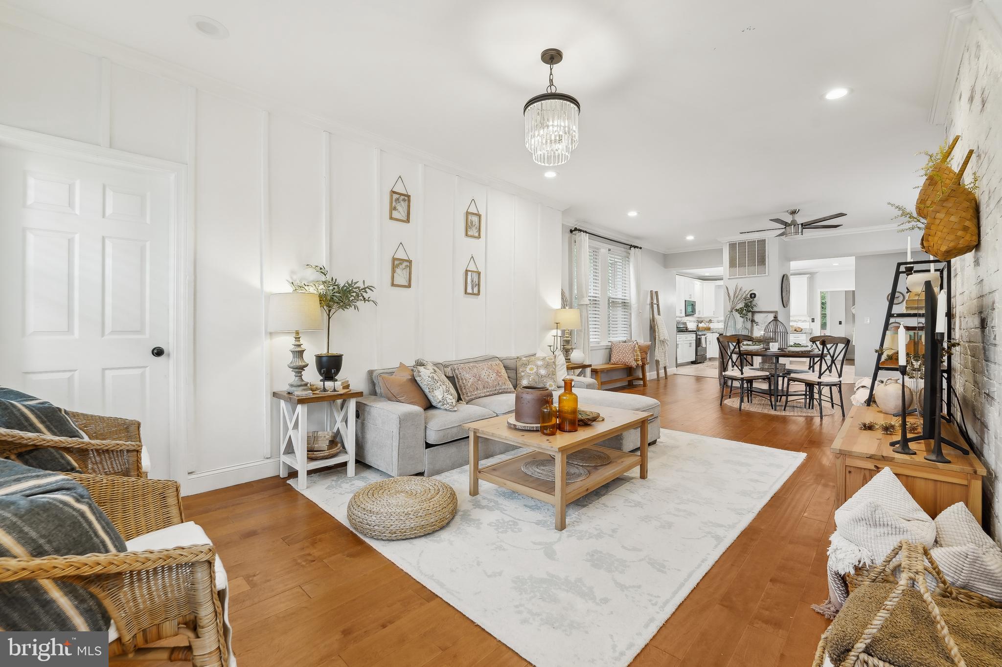 4124 Hamilton Avenue Baltimore, MD 21206 - Photo 9 of 41 a living room with furniture kitchen view and a large window