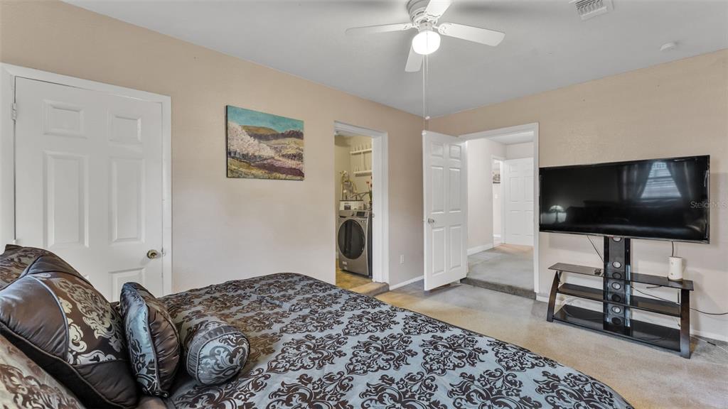 515 Easy Street Bartow, FL 33830 - Photo 18 of 25 a bedroom with a bed and a flat screen tv