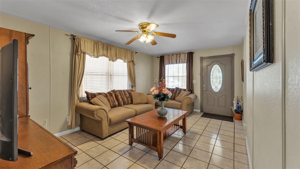 515 Easy Street Bartow, FL 33830 - Photo 5 of 25 a living room with furniture and a large window