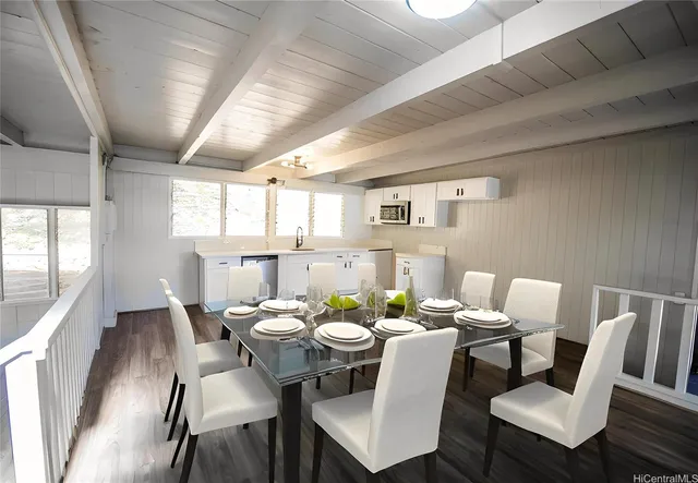 a view of a dining room with furniture and window