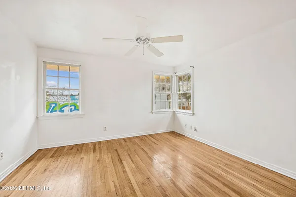 an empty room with windows