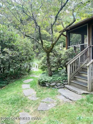 a view of an outdoor space and a yard