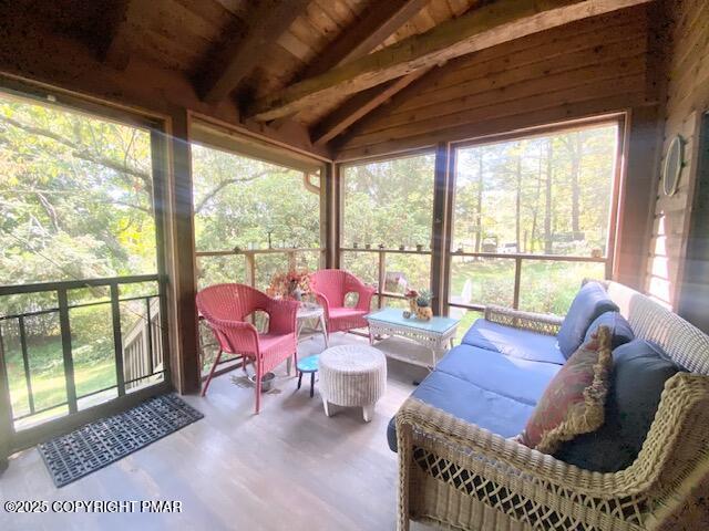 1153 Milford Road Dingmans Ferry, PA 18328 - Photo 19 of 50 a living room with furniture and a large window