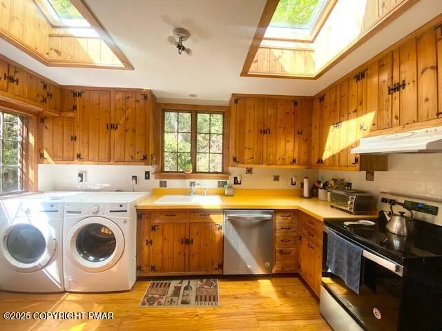 a bathroom with a sink a mirror and a shower curtain
