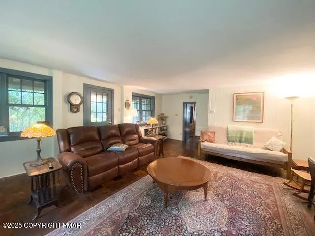 a bedroom with a bed and a night stand