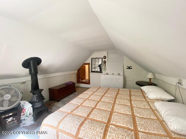 1153 Milford Road Dingmans Ferry, PA 18328 - Photo 37 of 50 a bedroom with a bed and a night stand