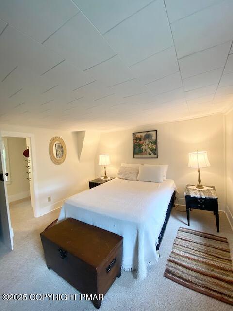 1153 Milford Road Dingmans Ferry, PA 18328 - Photo 40 of 50 a bed room with a bed and a lamp