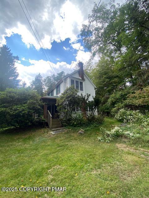 1153 Milford Road Dingmans Ferry, PA 18328 - Photo 4 of 50 a view of a garden