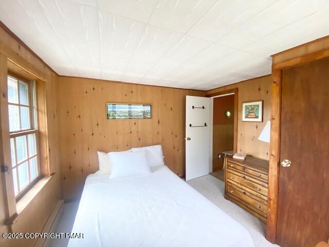 1153 Milford Road Dingmans Ferry, PA 18328 - Photo 44 of 50 a bedroom with a bed and a dresser