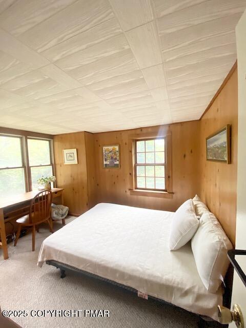 1153 Milford Road Dingmans Ferry, PA 18328 - Photo 45 of 50 a bedroom with a bed and wooden floor