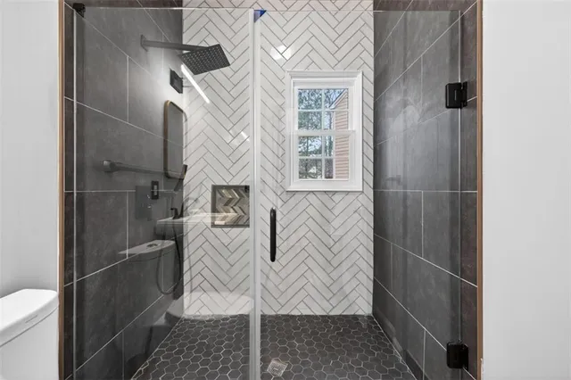 a bathroom with a sink and toilet