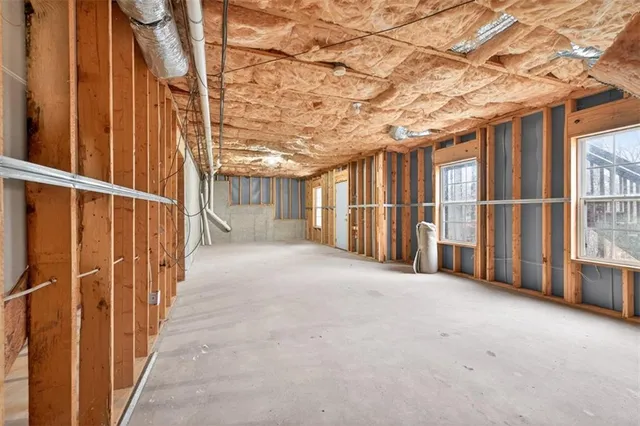 a view of a porch with wooden walls and stairs