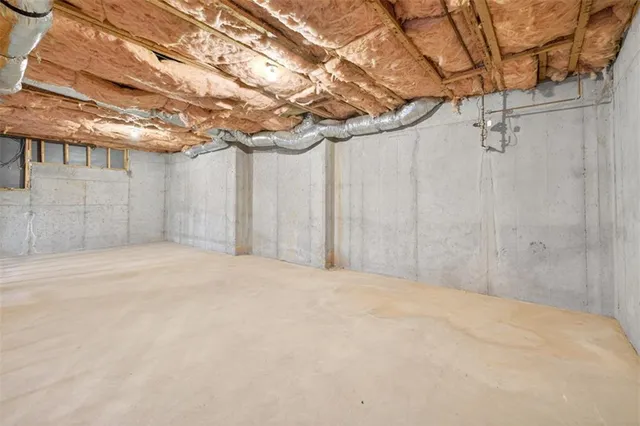 a view of a room with a wooden fence